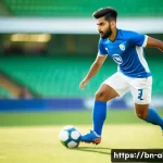 알제리 축구 스타 리야드 마레즈 - A dynamic action shot of a professional male football player with South Asian features wearing a mod...